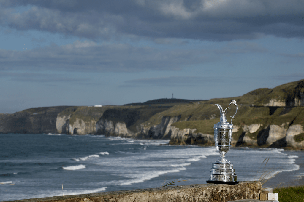 A photo of the Claret Jug by the coast at Royal Portrush